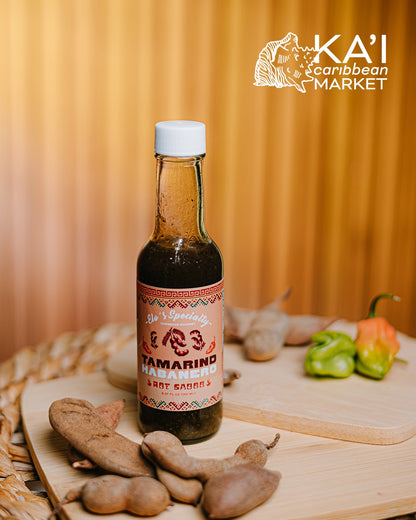 Kai Caribbean Market Tamarind Habanero hot sauce bottle with whole tamarind pods and habanero peppers