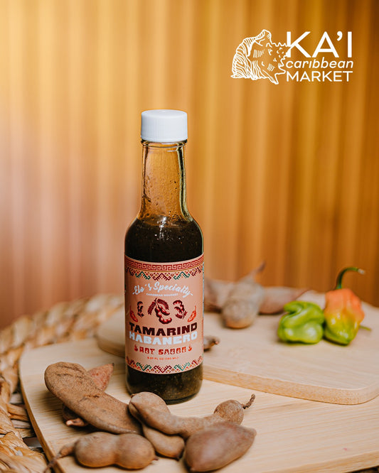 Kai Caribbean Market Tamarind Habanero hot sauce bottle with whole tamarind pods and habanero peppers